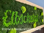 Mooswand mit Logo im Hotel & Restaurant Elbschetal in Wetter